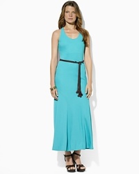 A sleek jersey maxi dress is crafted with a modern racerback and chic full skirt. A sleek jersey maxi dress is crafted with a modern racerback and chic full skirt.