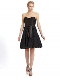 A sophisticated play on volume and texture, this cocktail option features a pleated satin bodice and voluminous mesh skirt adorned with flowers.Sweetheart neckline Pleated satin bodice Interior bra cups with boning Tie-waist Side zipper Mesh skirt with petticoat Fully lined About 38 from shoulder to hem Silk Second fabric: polyester Dry clean Imported A sophisticated play on volume and texture, this cocktail option features a pleated satin bodice and voluminous mesh skirt adorned with flowers.Sweetheart neckline Pleated satin bodice Interior bra cups with boning Tie-waist Side zipper Mesh skirt with petticoat Fully lined About 38 from shoulder to hem Silk Second fabric: polyester Dry clean Imported