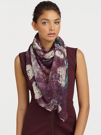 A palette of rich hues defines this elegant scarf, rendered in modal and cashmere and finished with eyelash fringe.90% modal/10% cashmereAbout 55 X 73Dry cleanImported