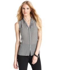 Vince Camuto's houndstooth blouse is the perfect layer to transition into fall with--wear solo with a pencil skirt or pair with a blazer and a pair of pants in a pop color. Vince Camuto's houndstooth blouse is the perfect layer to transition into fall with--wear solo with a pencil skirt or pair with a blazer and a pair of pants in a pop color.