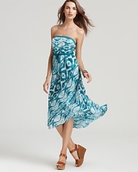 A vibrant print imbues this Velvet by Graham & Spencer strapless dress with an artistic spirit. A drawstring waist and high/low hem complete the vivid design. A vibrant print imbues this Velvet by Graham & Spencer strapless dress with an artistic spirit. A drawstring waist and high/low hem complete the vivid design.