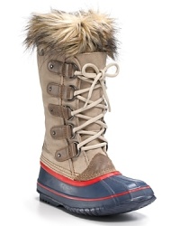 Bold and brilliantly hued, these faux fur-trimmed boots make a bright statement on the coldest of days. By Sorel. Bold and brilliantly hued, these faux fur-trimmed boots make a bright statement on the coldest of days. By Sorel.