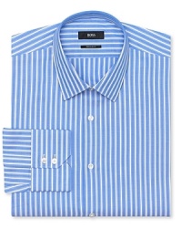 Based on a classic stripe design, this dress shirt offers tried-and-true refinement in superior cotton. Based on a classic stripe design, this dress shirt offers tried-and-true refinement in superior cotton.