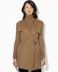 A long knit cardigan is designed with an open placket for modern style and finished with a flattering belted waist. A long knit cardigan is designed with an open placket for modern style and finished with a flattering belted waist.