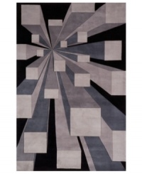 The next dimension. Gray cubes sprout from a single point atop an inky black ground, projecting outwards to create a dramatic three-dimensional design. Hand-tufted by expert artisans using a special blend of high-quality wools for a blissfully soft hand and superior shine. The next dimension. Gray cubes sprout from a single point atop an inky black ground, projecting outwards to create a dramatic three-dimensional design. Hand-tufted by expert artisans using a special blend of high-quality wools for a blissfully soft hand and superior shine.
