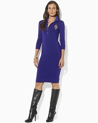 The classic polo dress is given a figure-flattering update, rendered in sleek stretch jersey with three-quarter-length sleeves. The classic polo dress is given a figure-flattering update, rendered in sleek stretch jersey with three-quarter-length sleeves.