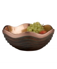Featuring a bold new look for Nambe's signature metal, the Copper Canyon bowl captures the striking beauty of the American Southwest in brilliant copper. A rippled shape inspired by the region's wind- and water-worn canyons is finished with a rustic green patina. Featuring a bold new look for Nambe's signature metal, the Copper Canyon bowl captures the striking beauty of the American Southwest in brilliant copper. A rippled shape inspired by the region's wind- and water-worn canyons is finished with a rustic green patina.