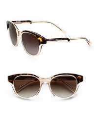 A rounded style in lightweight plastic with a modern appeal. Available in black with grey lens or havana/transparent yellow with brown gradient lens. Logo temples100% UV protectionMade in Italy A rounded style in lightweight plastic with a modern appeal. Available in black with grey lens or havana/transparent yellow with brown gradient lens. Logo temples100% UV protectionMade in Italy
