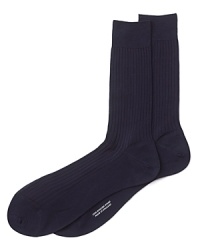 Turnbull & Asser maintains its focus on quality craftsmanship and luxury even on everyday essentials like fine dress socks in soft, breathable cotton. Turnbull & Asser maintains its focus on quality craftsmanship and luxury even on everyday essentials like fine dress socks in soft, breathable cotton.