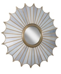 With warm brass accents and intricate scalloping that suggests a stylish spider's web and the sun, this Regina Andrew mirror radiates unique beauty and is sure to become the focal point in any room. With warm brass accents and intricate scalloping that suggests a stylish spider's web and the sun, this Regina Andrew mirror radiates unique beauty and is sure to become the focal point in any room.