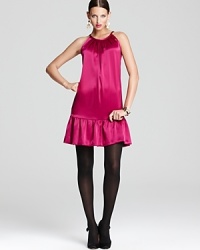 Tap into your inner frill seeker with a luminous DKNY dress flaunting a trend-right dropped waist trimmed with decadent ruffles. Tap into your inner frill seeker with a luminous DKNY dress flaunting a trend-right dropped waist trimmed with decadent ruffles.