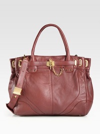 A roomy top-handle carryall in supple pebbled leather with a detachable strap for added versatility. Available in black with silvertone hardware, merlot with goldtone hardware or emerald with goldtone hardware. Double top handles, 6 dropDetachable shoulder strap, 21 dropMagnetic top closureProtective metal feetOne inside zip pocketTwo inside open pocketsFully lined13½W X 12H X 5DImportedPlease note: Hardware color varies by bag. A roomy top-handle carryall in supple pebbled leather with a detachable strap for added versatility. Available in black with silvertone hardware, merlot with goldtone hardware or emerald with goldtone hardware. Double top handles, 6 dropDetachable shoulder strap, 21 dropMagnetic top closureProtective metal feetOne inside zip pocketTwo inside open pocketsFully lined13½W X 12H X 5DImportedPlease note: Hardware color varies by bag.