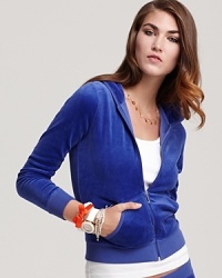 Embrace the weekend in this Juicy Couture velour hoodie--a luxe addition to your laid-back style. Embrace the weekend in this Juicy Couture velour hoodie--a luxe addition to your laid-back style.