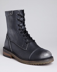 Diesel's rough-and-tumbled boots get tough with a distressed cap toe and punk-inspired laceup vamp. Diesel's rough-and-tumbled boots get tough with a distressed cap toe and punk-inspired laceup vamp.