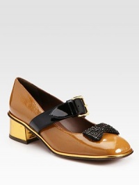 Timeless Mary Jane silhouette in two-tone patent leather, updated with a rhinestone bow and sleek metallic heel. Metallic leather heel, 1½ (40mm)Patent leather upper with satin rhinestone-coated bowLeather lining and solePadded insoleMade in Italy Timeless Mary Jane silhouette in two-tone patent leather, updated with a rhinestone bow and sleek metallic heel. Metallic leather heel, 1½ (40mm)Patent leather upper with satin rhinestone-coated bowLeather lining and solePadded insoleMade in Italy