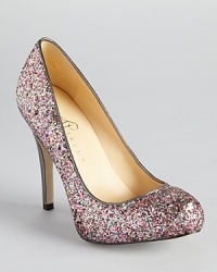 In multicolor glitter, IVANKA TRUMP's Pinki pumps are a party for your feet. These fun-loving, colorful shoes breathe playful life into your after-dark look. In multicolor glitter, IVANKA TRUMP's Pinki pumps are a party for your feet. These fun-loving, colorful shoes breathe playful life into your after-dark look.