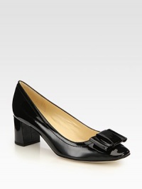 A perfectly-placed bow completes this feminine staple of shiny Italian patent leather. Self-covered heel, 2¼ (60mm)Patent leather upperLeather lining and solePadded insoleMade in Italy A perfectly-placed bow completes this feminine staple of shiny Italian patent leather. Self-covered heel, 2¼ (60mm)Patent leather upperLeather lining and solePadded insoleMade in Italy