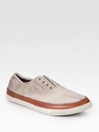 Roughened by a laceless front, contrasting leather trim adds a two-tone touch to this soft cotton and suede design. Leather liningPadded insoleRubber soleImported Roughened by a laceless front, contrasting leather trim adds a two-tone touch to this soft cotton and suede design. Leather liningPadded insoleRubber soleImported