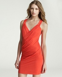 Intricately draped, this Velvet by Graham & Spencer dress cuts an ultra-flattering silhouette. Intricately draped, this Velvet by Graham & Spencer dress cuts an ultra-flattering silhouette.
