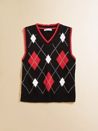 A classic knit vest is crafted in plush cotton and accented with a colorful argyle design.V-neckSleevelessPullover styleCottonMachine washImported A classic knit vest is crafted in plush cotton and accented with a colorful argyle design.V-neckSleevelessPullover styleCottonMachine washImported