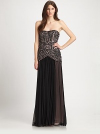 An airy, floor-length waterfall skirt, crowned by a luxe soutache embroidered bodice.StraplessAllover soutache embroideryLayered skirtConcealed side zipFully linedAbout 45 from natural waistNylonSpot cleanImportedModel shown is 5'10½ (179cm) wearing US size 4. An airy, floor-length waterfall skirt, crowned by a luxe soutache embroidered bodice.StraplessAllover soutache embroideryLayered skirtConcealed side zipFully linedAbout 45 from natural waistNylonSpot cleanImportedModel shown is 5'10½ (179cm) wearing US size 4.