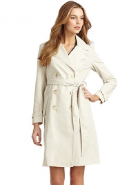 THE LOOKNotched lapelLong sleeves with fabric tab on cuffsButton closureTie waistDual flap pocketsCrisscross fabric detail in backTHE FITAbout 38 from shoulder to hemTHE MATERIAL81% cotton/19% nylonSilk liningCARE & ORIGINDry cleanMade in USAModel shown is 5'10 (177cm) wearing US size 4. THE LOOKNotched lapelLong sleeves with fabric tab on cuffsButton closureTie waistDual flap pocketsCrisscross fabric detail in backTHE FITAbout 38 from shoulder to hemTHE MATERIAL81% cotton/19% nylonSilk liningCARE & ORIGINDry cleanMade in USAModel shown is 5'10 (177cm) wearing US size 4.