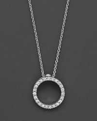 From the Tiny Treasures collection, an extra small diamond circle necklace; with signature ruby accent. Designed by Roberto Coin. From the Tiny Treasures collection, an extra small diamond circle necklace; with signature ruby accent. Designed by Roberto Coin.
