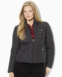 The lightweight barn jacket boasts an elegant quilted silhouette and is finished with a mockneck collar and chic hardware for a classic cold-weather look. The lightweight barn jacket boasts an elegant quilted silhouette and is finished with a mockneck collar and chic hardware for a classic cold-weather look.