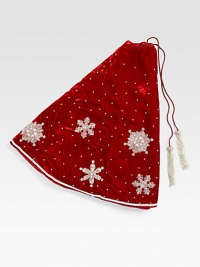 EXCLUSIVELY AT SAKS. Shimmering hand-embroidered snowflakes float across this lush velvet tree skirt, from renowned designer Sudha Pennathur. HandcraftedVelvet with bead embroidery50 diam.Dry cleanImported