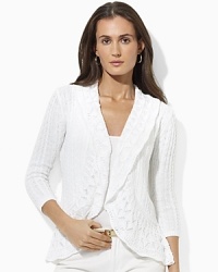 The definition of chic heritage, the Velika cardigan is crafted in a softly draped shawl-collar silhouette from delicately pointelle-knit slub cotton. The definition of chic heritage, the Velika cardigan is crafted in a softly draped shawl-collar silhouette from delicately pointelle-knit slub cotton.
