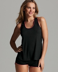 A sporty burnout tank top and shorts set featuring contrast trim. A sporty burnout tank top and shorts set featuring contrast trim.