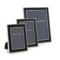 Supple alligator-embossed leather pairs with crisp, clean polished silver plate to give this Ralph Lauren Home frame striking textural contrast. Supple alligator-embossed leather pairs with crisp, clean polished silver plate to give this Ralph Lauren Home frame striking textural contrast.