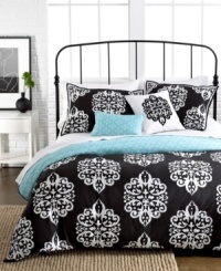 Simply striking. The Sunset and Vines Dalton duvet cover set brings decidedly modern style to the bedroom with a smart black and white medallion pattern. Reverses to a subtle design in a soft blue tone for a refreshing option. Simply striking. The Sunset and Vines Dalton duvet cover set brings decidedly modern style to the bedroom with a smart black and white medallion pattern. Reverses to a subtle design in a soft blue tone for a refreshing option.