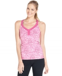 Ideology's fitted tank top combines comfort and style for the gym, thanks to a punchy print and a smart built-in shelf bra. (Clearance) Ideology's fitted tank top combines comfort and style for the gym, thanks to a punchy print and a smart built-in shelf bra. (Clearance)