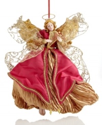 A soothing presence throughout the season, this Holiday Lane angel ornaments your tree with wings of shimmering gold and festive red. Her sparkling harp sets the tone for every holiday. A soothing presence throughout the season, this Holiday Lane angel ornaments your tree with wings of shimmering gold and festive red. Her sparkling harp sets the tone for every holiday.