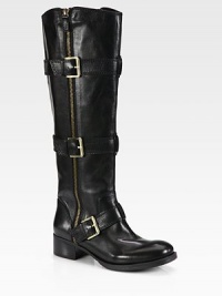 Undeniably cool leather design with adjustable buckle straps, exposed zippers and a stacked heel. Stacked heel, 1½ (40mm)Shaft, 16½Leg circumference, 15Leather upperExposed zipper on both sidesAdjustable buckle strapsLeather liningRubber solePadded insoleImported Undeniably cool leather design with adjustable buckle straps, exposed zippers and a stacked heel. Stacked heel, 1½ (40mm)Shaft, 16½Leg circumference, 15Leather upperExposed zipper on both sidesAdjustable buckle strapsLeather liningRubber solePadded insoleImported