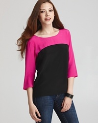 This Amanda Uprichard top packs a punch with bold, graphic block colors. This Amanda Uprichard top packs a punch with bold, graphic block colors.