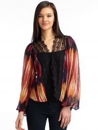 THE LOOKEthnic printContrast scalloped lace front trimOpen frontLong sleevesHi-lo hemTHE FITAbout 21 from shoulder to hemTHE MATERIALViscoseCARE & ORIGINDry cleanImportedModel shown is 5'10½ (179cm) wearing US size Small. THE LOOKEthnic printContrast scalloped lace front trimOpen frontLong sleevesHi-lo hemTHE FITAbout 21 from shoulder to hemTHE MATERIALViscoseCARE & ORIGINDry cleanImportedModel shown is 5'10½ (179cm) wearing US size Small.