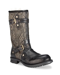 Combining tough-chic, moto-inspired style and elegant fabric overlays, these UGG® Collection boots pair leather and lace to fantastic effect. Combining tough-chic, moto-inspired style and elegant fabric overlays, these UGG® Collection boots pair leather and lace to fantastic effect.