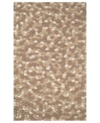 Like the dappled floor of a natural spring, the Earth rug from the Gallia collection is delight to behold. With a richly textured surface that can only be created through intricate hand carving, the rug offers a pebble motif in muted, organic hues for an inspiring addition to your decor. Like the dappled floor of a natural spring, the Earth rug from the Gallia collection is delight to behold. With a richly textured surface that can only be created through intricate hand carving, the rug offers a pebble motif in muted, organic hues for an inspiring addition to your decor.