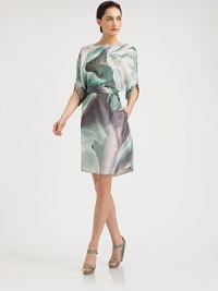 A watercolor lily print is rendered in silk chiffon, finished with hidden pockets and cinched with a matching sash belt.BoatneckThree-quarter sleevesSelf sash beltSide slash pocketsFully linedAbout 24 from natural waistSilkDry cleanMade in Italy of imported fabricModel shown is 5'10½ (177cm) wearing US size 4. A watercolor lily print is rendered in silk chiffon, finished with hidden pockets and cinched with a matching sash belt.BoatneckThree-quarter sleevesSelf sash beltSide slash pocketsFully linedAbout 24 from natural waistSilkDry cleanMade in Italy of imported fabricModel shown is 5'10½ (177cm) wearing US size 4.