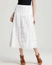 Fluttering eyelet decorates a fresh white silhouette for a MICHAEL Michael Kors skirt that is effortlessly elegant. Fluttering eyelet decorates a fresh white silhouette for a MICHAEL Michael Kors skirt that is effortlessly elegant.