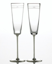 Begin a glorious meal--and life--together with a magical toast. From kate spade, these crystal champagne glasses feature brilliant silver-plated stems and sheer bands with either Mr. or Mrs. engraved on each rim. Coordinates with the rest of the handsome and modern Darling Point collection. Begin a glorious meal--and life--together with a magical toast. From kate spade, these crystal champagne glasses feature brilliant silver-plated stems and sheer bands with either Mr. or Mrs. engraved on each rim. Coordinates with the rest of the handsome and modern Darling Point collection.