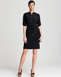 Master utilitarian city-chic in this Calvin Klein shirt dress. A pared-down silhouette sets the framework for smart, strong dressing, whether you're headed to cocktails or the corner office. Master utilitarian city-chic in this Calvin Klein shirt dress. A pared-down silhouette sets the framework for smart, strong dressing, whether you're headed to cocktails or the corner office.