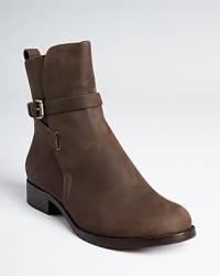 KORS Michael Kors refines the moto boot silhouette with the Adele, implementing softer lines for a more delicate silhouette. KORS Michael Kors refines the moto boot silhouette with the Adele, implementing softer lines for a more delicate silhouette.