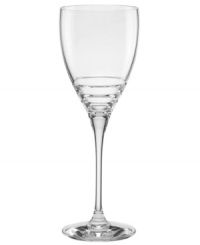 Three sharp lines juxtapose the fluid elegance of this goblet from the Percival Place crystal stemware collection for a look of brilliant sophistication by kate spade new york.