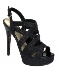 Everything is better with glitter. The eye-catching Kio platform sandals by GUESS take a sexy, strappy silhouette and make it even better with light-reflecting accents. Everything is better with glitter. The eye-catching Kio platform sandals by GUESS take a sexy, strappy silhouette and make it even better with light-reflecting accents.