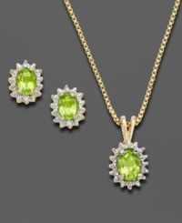 This set, consisting of earrings and a matching pendant, will lend chic sophistication to your everyday style. Victoria Townsend's design is inspired by royalty with exquisite oval-shaped peridots (1-3/4 ct. t.w.) flanked by sparkling diamond accents. Set in 18k gold over sterling silver. Approximate length: 18 inches. Approximate pendant drop: 5/8 inch. Approximate earring diameter: 3/8 inch. This set, consisting of earrings and a matching pendant, will lend chic sophistication to your everyday style. Victoria Townsend's design is inspired by royalty with exquisite oval-shaped peridots (1-3/4 ct. t.w.) flanked by sparkling diamond accents. Set in 18k gold over sterling silver. Approximate length: 18 inches. Approximate pendant drop: 5/8 inch. Approximate earring diameter: 3/8 inch.