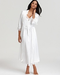 A gorgeous long robe with lace trim and bow accents. A gorgeous long robe with lace trim and bow accents.