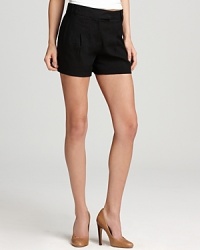The definitive warm-weather staple, these black French Connection shorts are sophisticated for spring with polished pleats for classic chic. The definitive warm-weather staple, these black French Connection shorts are sophisticated for spring with polished pleats for classic chic.